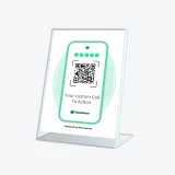 Tripadvisor QR Reviews sign placed on holder to gain reviews at reception counter