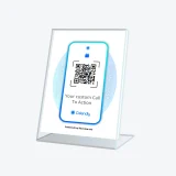 Calendly QR code booking sign at reception for quick appointment scheduling
