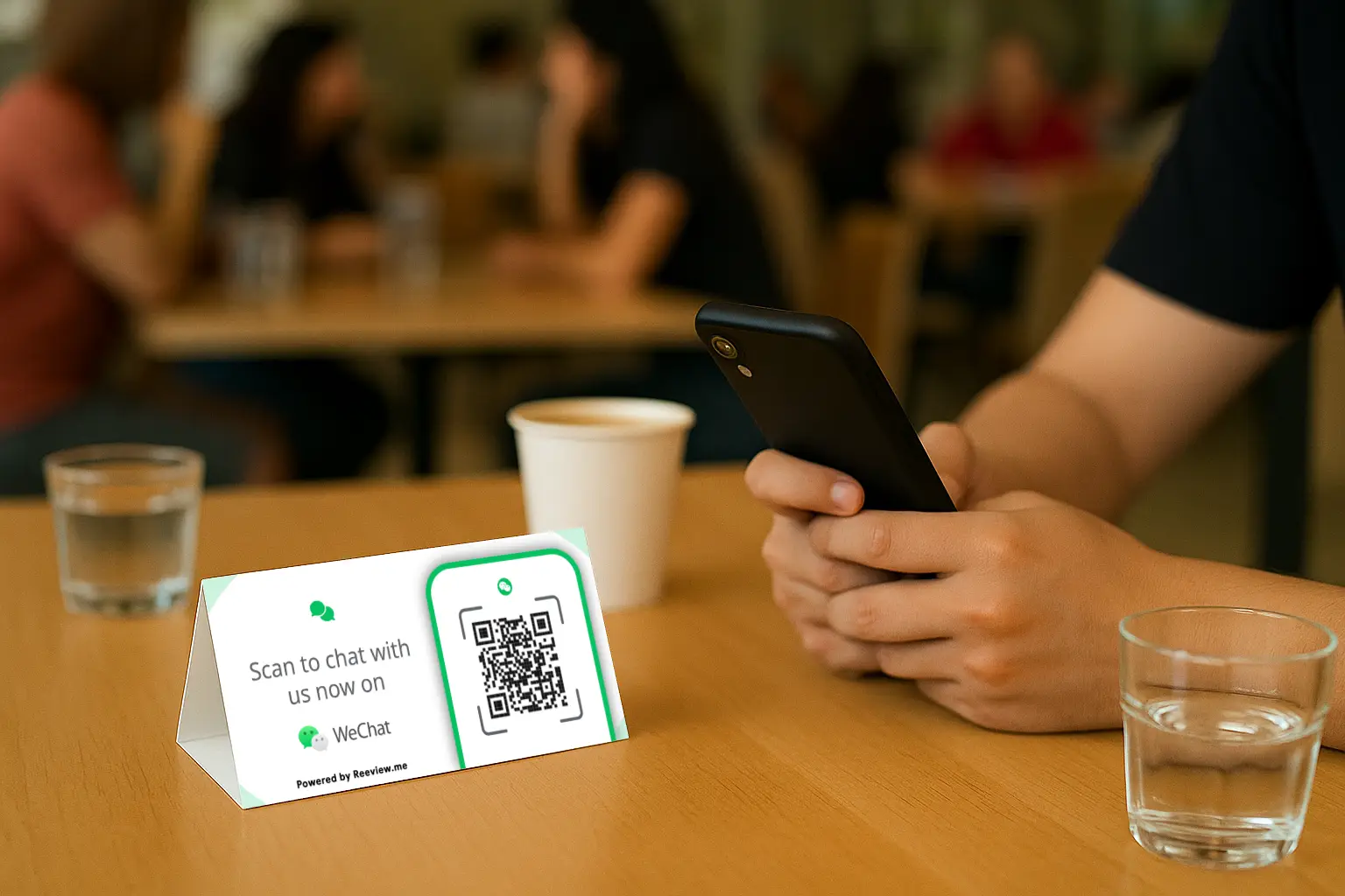 WeChat QR table tent inviting chats in a restaurant setting